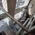 Innenbereich und Treppenaufgang im Image Hair Salon